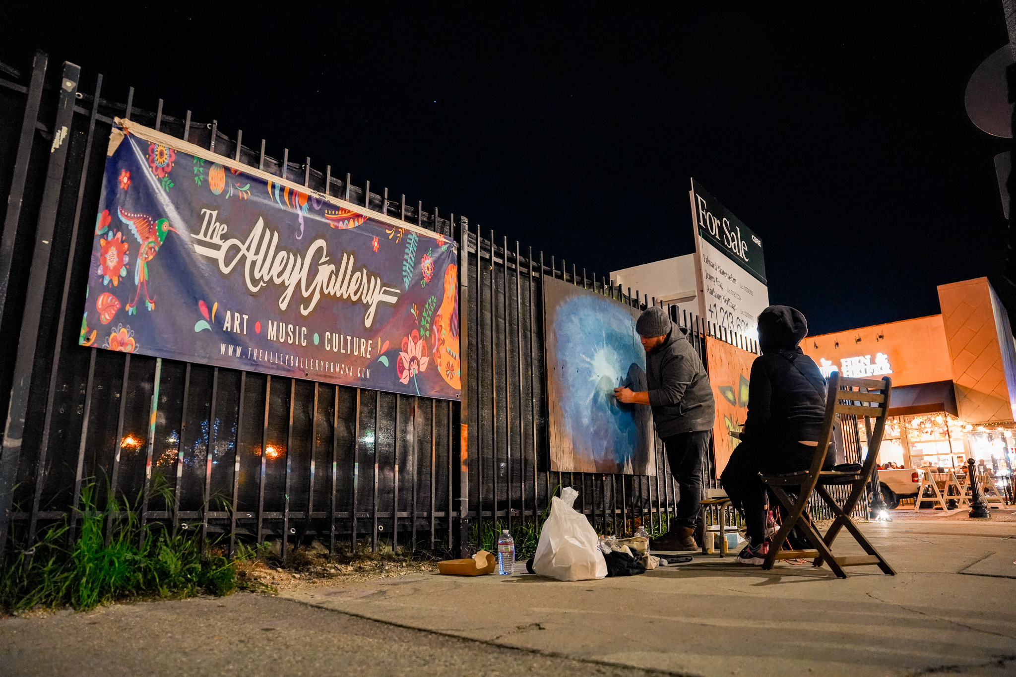 Artists painting at The Alley Gallery in Pomona